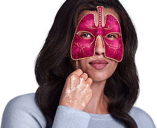 Woman with long hair and pink mask looking at an angle