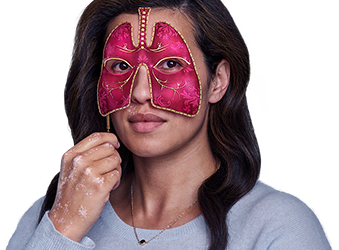 Woman with long hair and pink mask