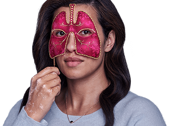 Woman with long hair and pink mask